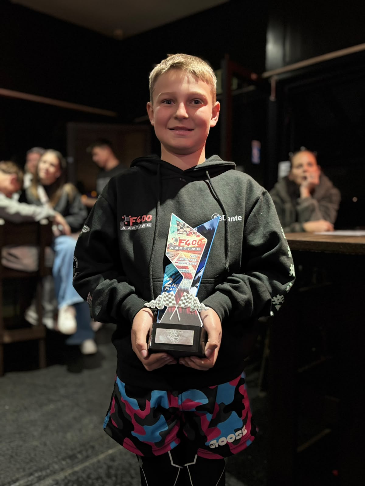 Dante Le Roux with racing trophy